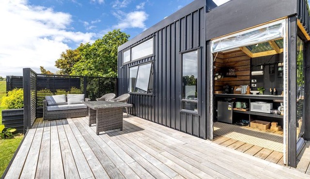Charming Tiny House Surrounded by Trees in New Plymouth, North Island in new plymouth