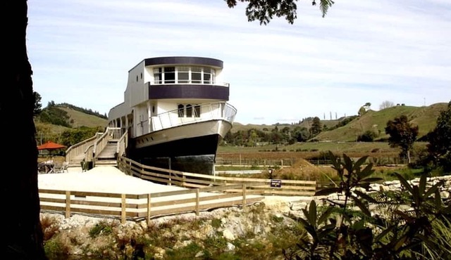 Renovated Historical WWII Ship on Land in Waitomo, New Zealand in Otorohanga
