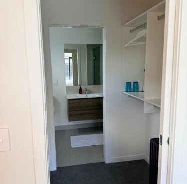 Modern ensuite master bedroom in a shared home in Hamilton