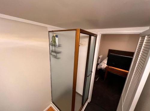 Studio is 2nd door past carport